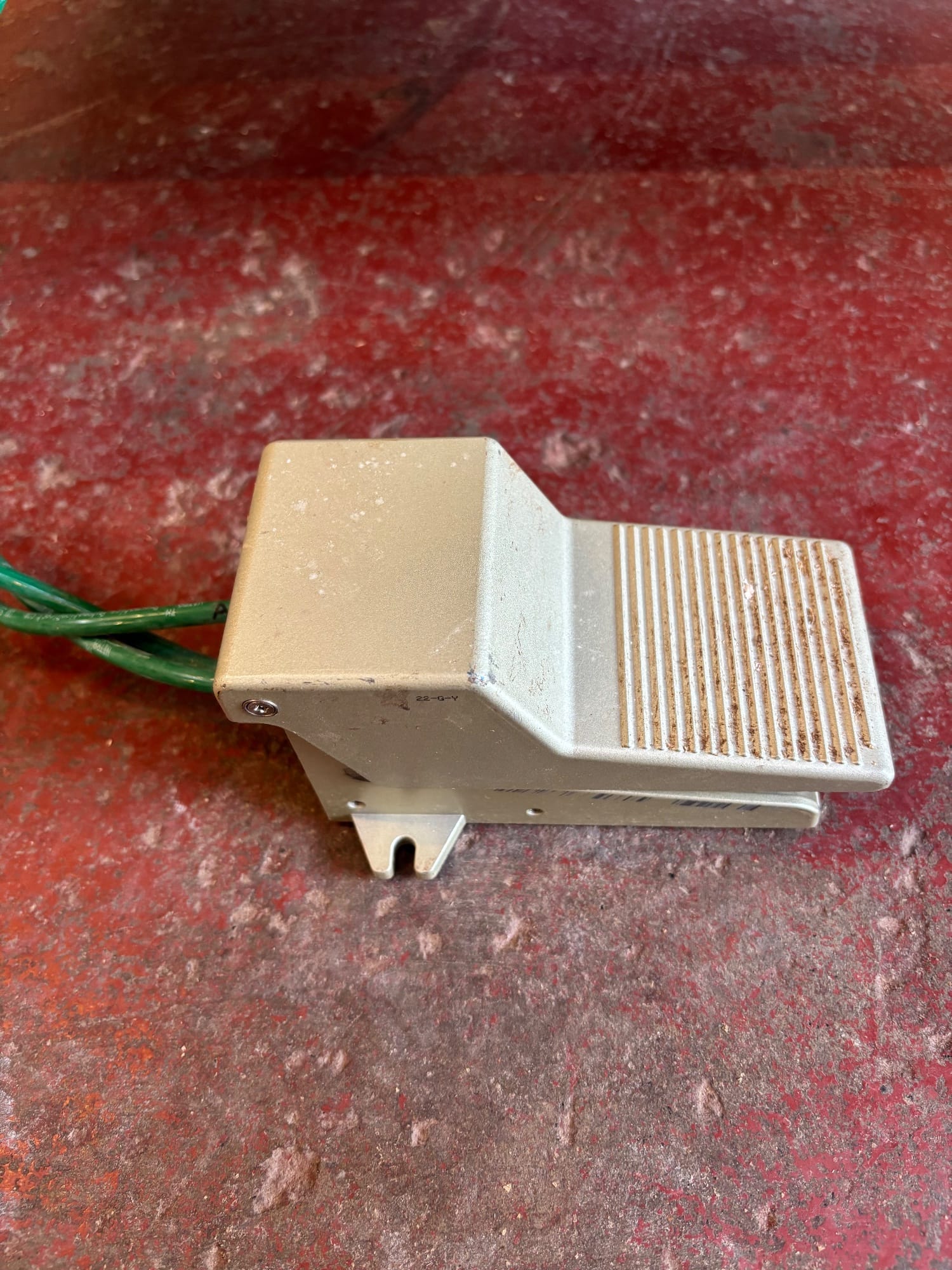 Foot pedal for hands-free bagging